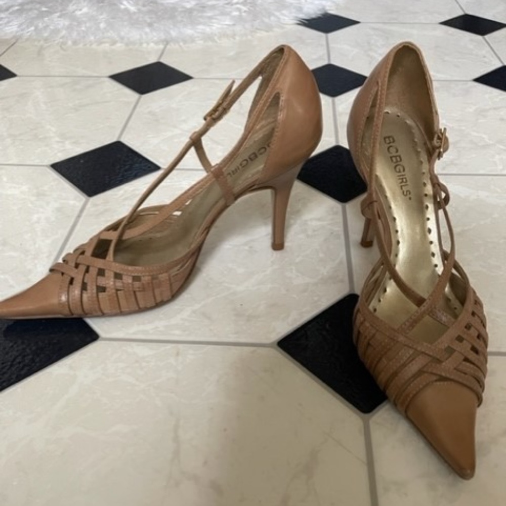 BCBGirls Tan Strappy, pointed toe Pumps.